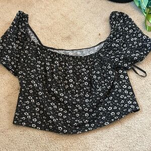 black shirt with flowers